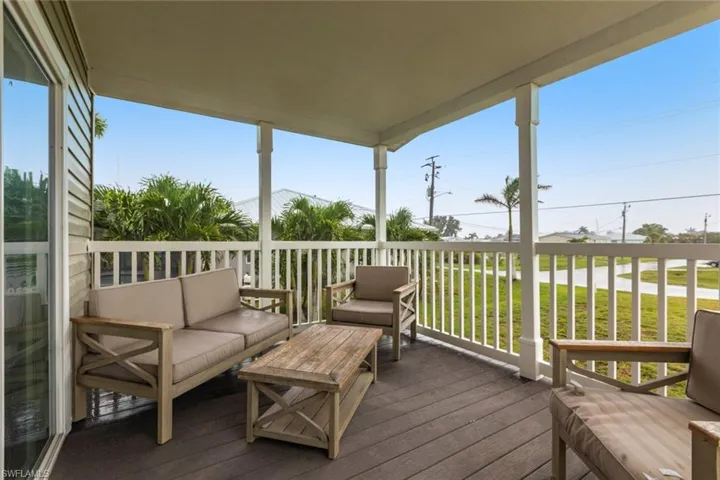 Wooden deck with outdoor lounge area