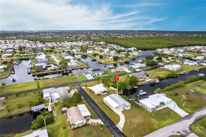 Aerial view of residential area with a large body of water