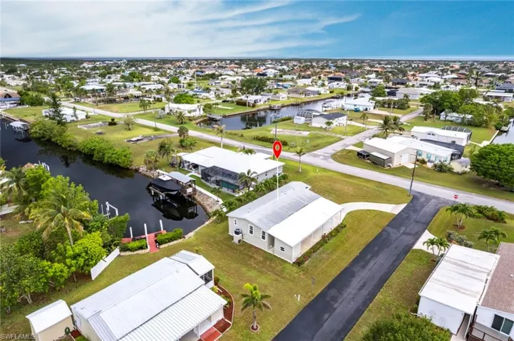 Aerial view of residential area with a large body of water