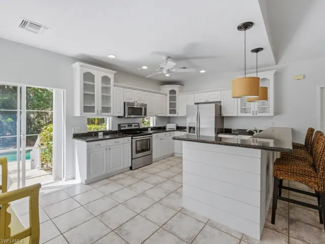 Kitchen overlooking the Pool Area
