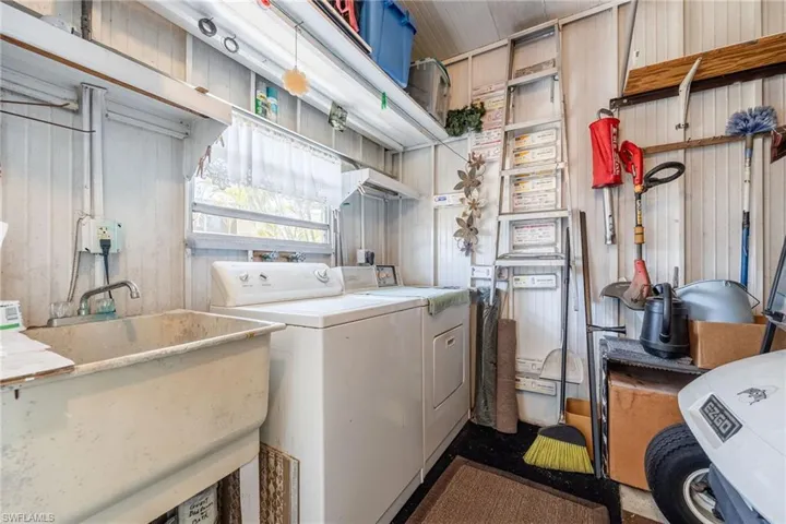 Laundry area featuring independent washer and dryer