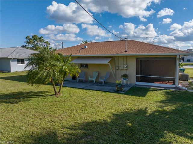 Concrete patio with overhead awning
