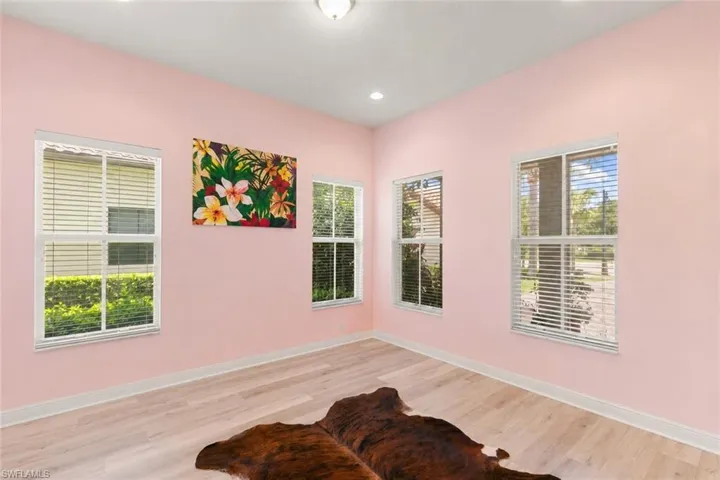 Flexible Den for a home office, hobby room or formal Living Room.