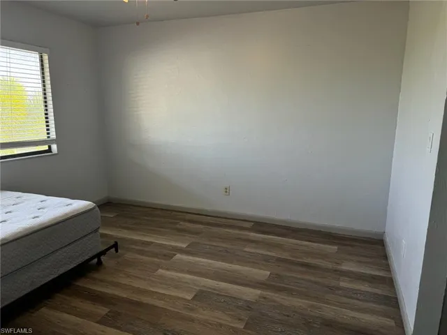 Bedroom featuring hardwood / wood-style flooring