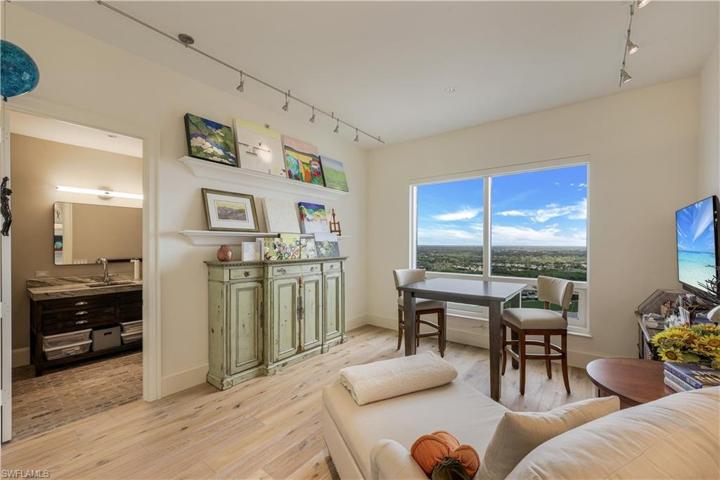 The spacious bedroom with ensuite on the southeastern side of the home is currently being utilized as an artist studio.