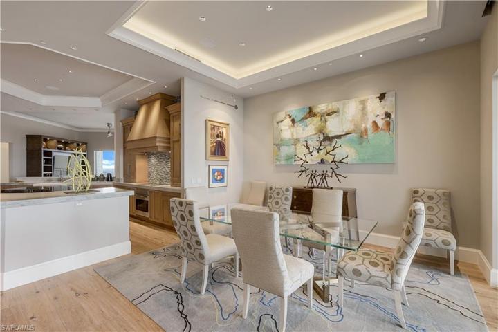 Your dinner guests will rave about the glorious view (and the design elements of this room).