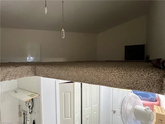 Lots of storage above washer and dryer