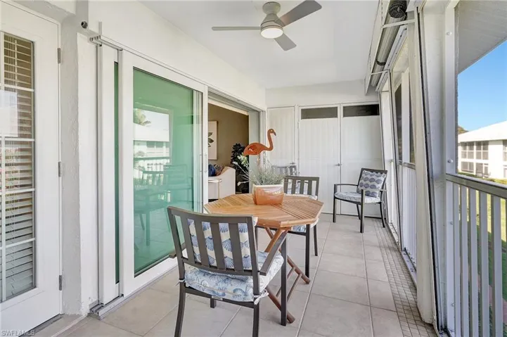 Sunroom with ceiling fan