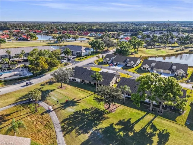 Aerial view of residential area with a nearby body of water
