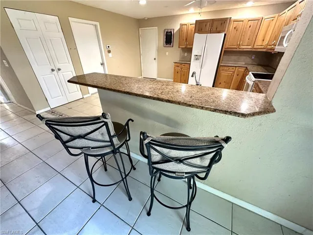 10090 Sunshine DR, BONITA SPRINGS FL 34135