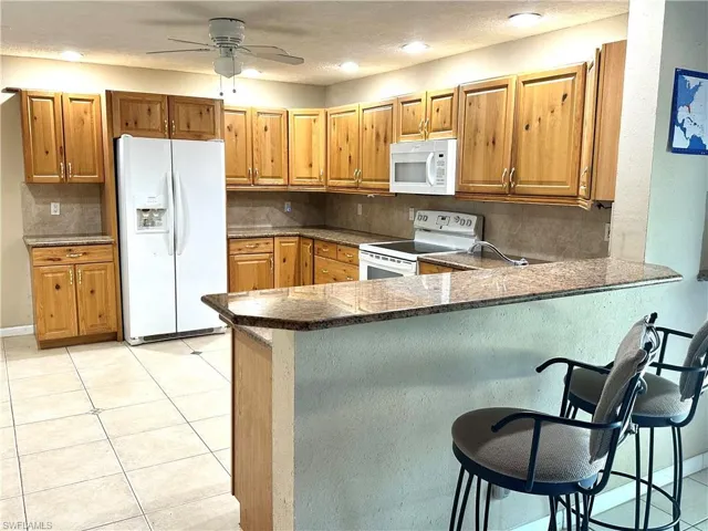 10090 Sunshine DR, BONITA SPRINGS FL 34135