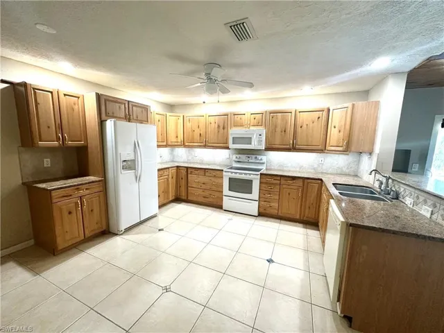 10090 Sunshine DR, BONITA SPRINGS FL 34135