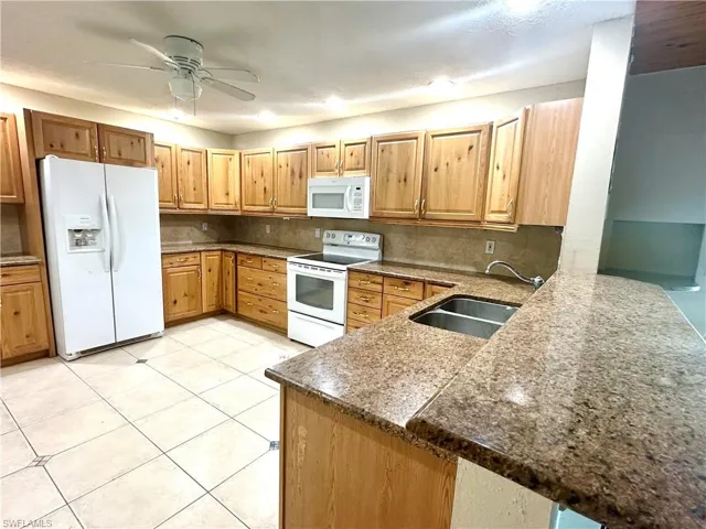 10090 Sunshine DR, BONITA SPRINGS FL 34135