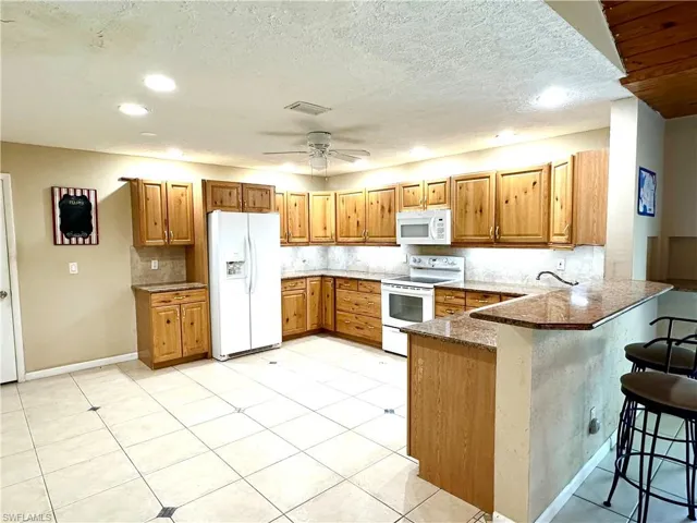 10090 Sunshine DR, BONITA SPRINGS FL 34135