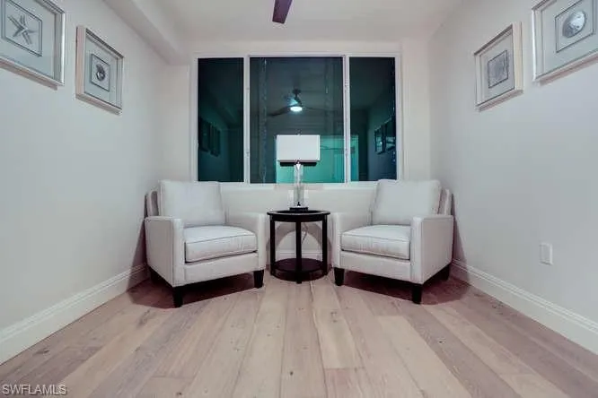 Sitting room off second Master bedroom-style floors and ceiling fan