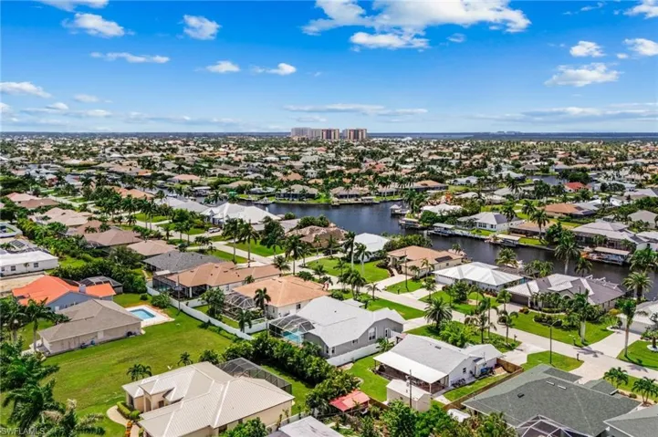 Aerial view with a residential view and a water view