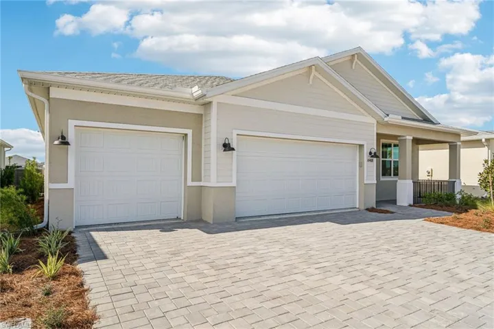 Ranch-style house with a garage