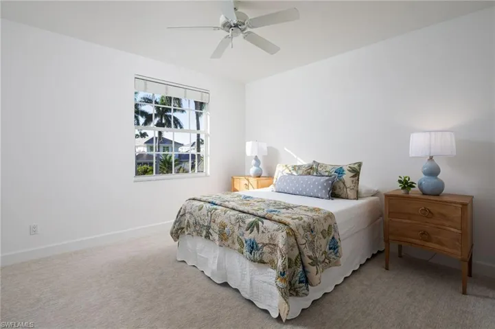Bedroom featuring carpet floors and a ceiling fan