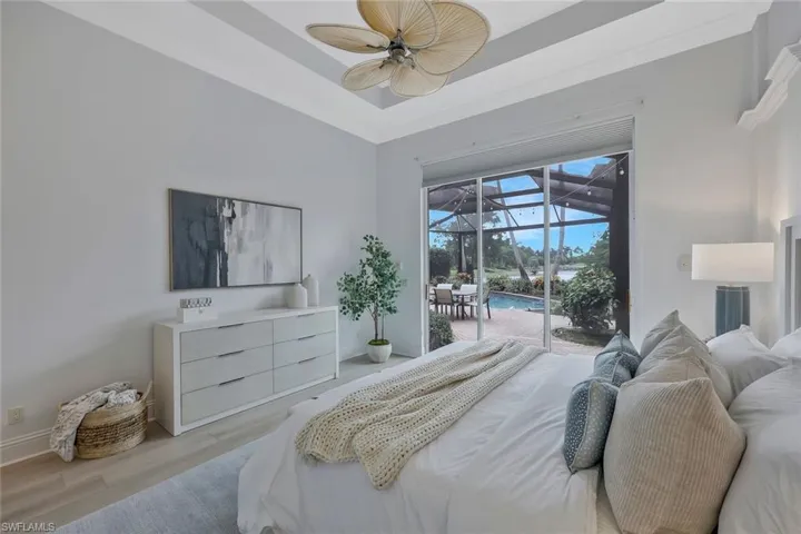 Master Bedroom, with easy access to pool area, with water and golf course views.