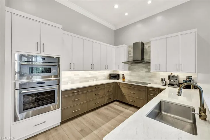 Sleek solid wood cabinetry with Quartz Counters