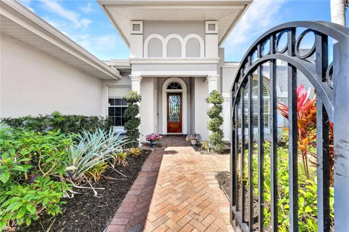 Property entrance with stucco siding
