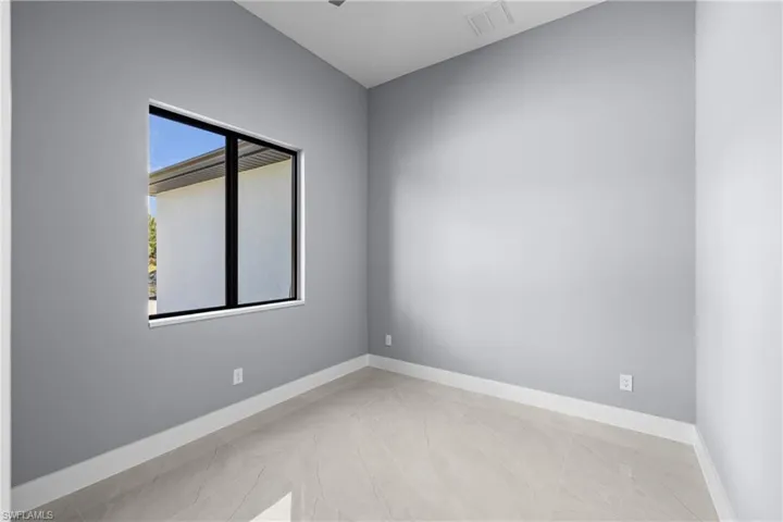 View of tiled spare room