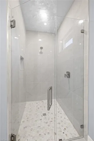 Bathroom featuring walk in shower