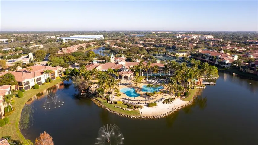 Aerial view of residential area with a large body of water