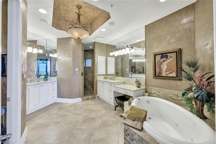 Master bath with walk in shower, separate tub and bidet