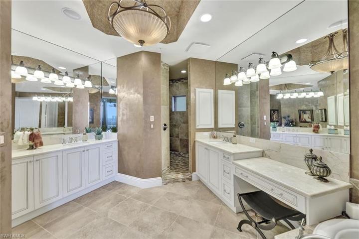Master bath with dual vanities and walk in shower