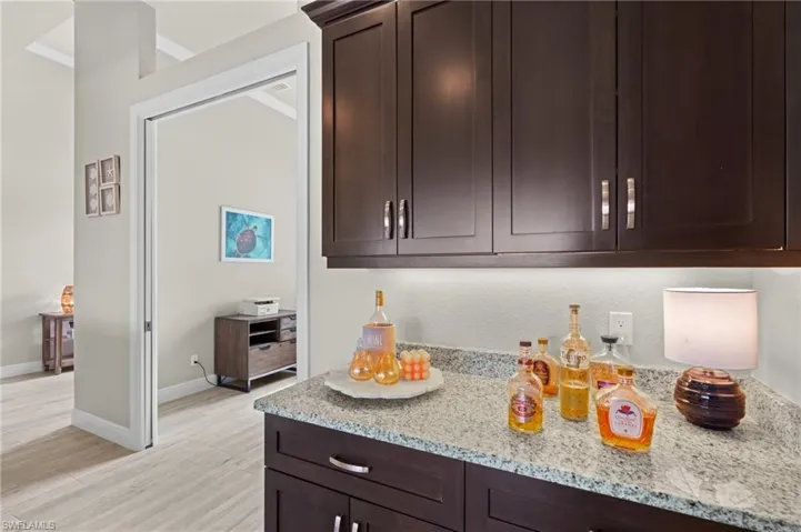 Bar are conveniently located outside of the Den/Office are but close to kitchen.  Great for a coffee bar set-up also.