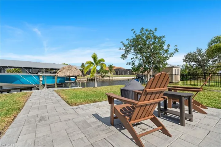 Large back yard offers another outdoor space for a fire pit or outdoor seating in the sun
