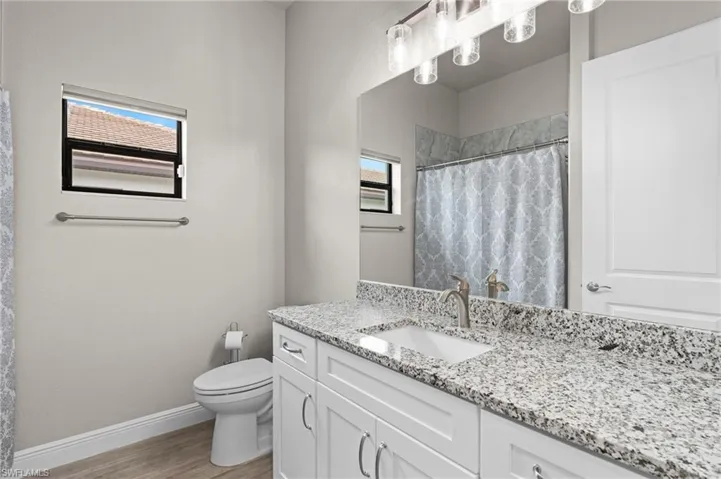 Main bath off hallway with full tub