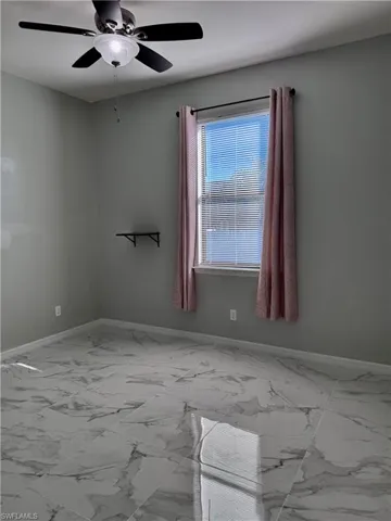 Empty room with ceiling fan