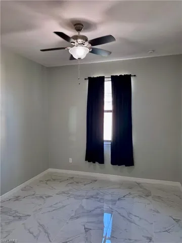 Empty room with ceiling fan