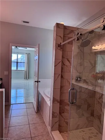 Bathroom with separate shower and tub