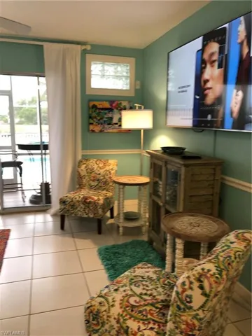 Sitting room with large screen TV included.