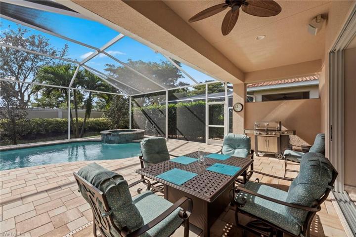Covered lanai looking out to pool
