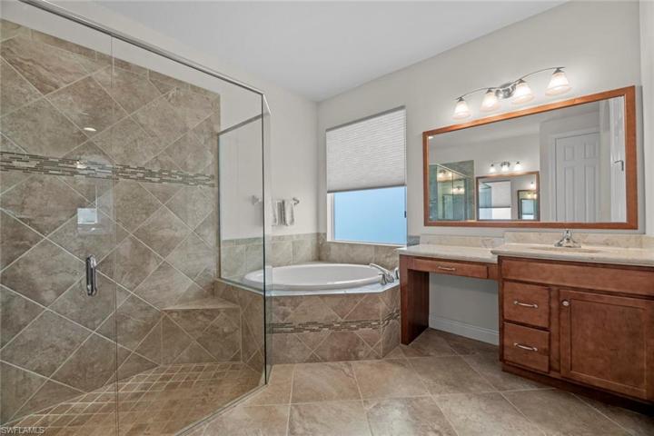 Dual vanities, large soaking tub