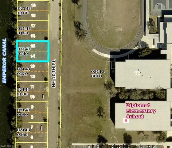 Aerial map of property and surrounding area featuring property boundaries highlighted