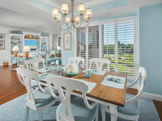 Open, light and bright. Notice the hardwood flooring throughout the main living areas.