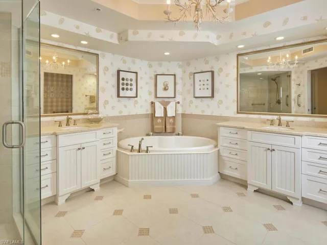 Plenty of room for two in this expansive primary bathroom.