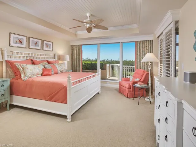 Following a day at the beach club or on the golf course, this lovely primary suite is where you will happily "recharge."  PLUS, you can access the pool directly from the primary suite terrace.