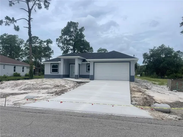 View of front of home featuring a garage