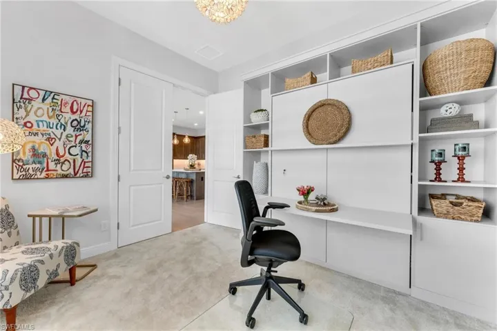 3rd Bedroom/Set up as an office with custom wall unit/bed inset