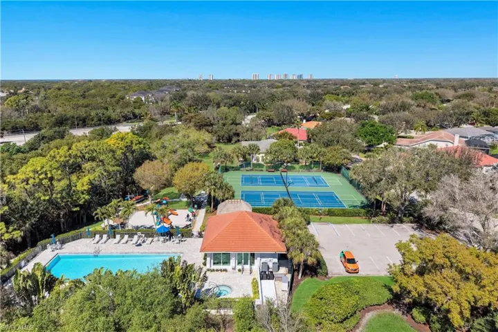 Drone / aerial view of a pool and skyline