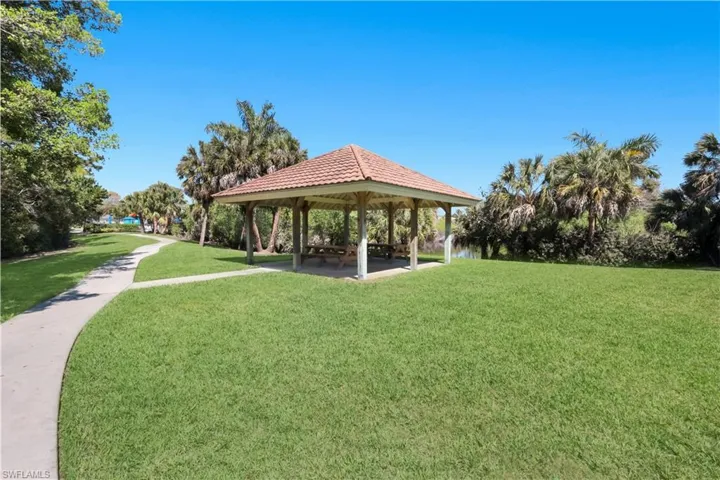 View of home's community with a gazebo and a patio