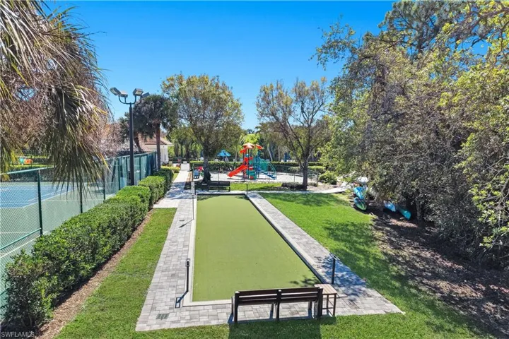 View of community with a bocce ball area