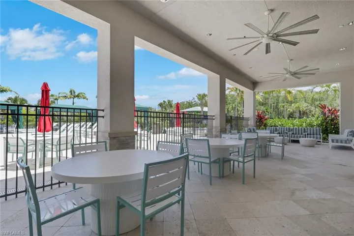 Ourdoor patio overlooking pool.