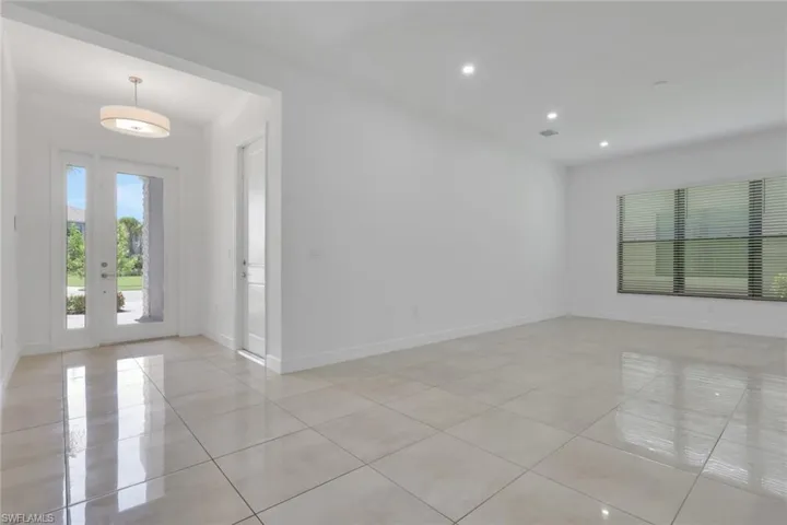Entryway opens into large flex room ideal as living room, playroom or office.